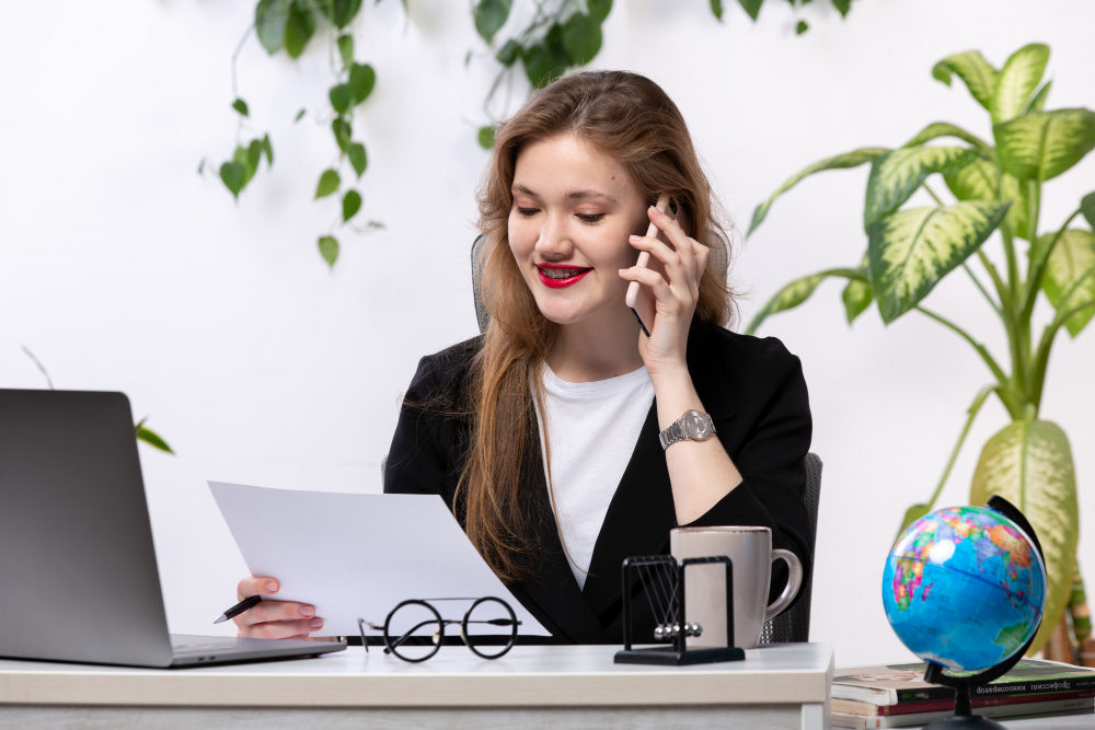 Young beautiful lady talking on the phone